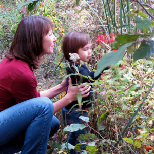 Jen Mendez with her daughter exploring the environment