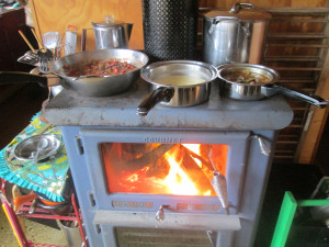 Wood stove performing multiple tasks